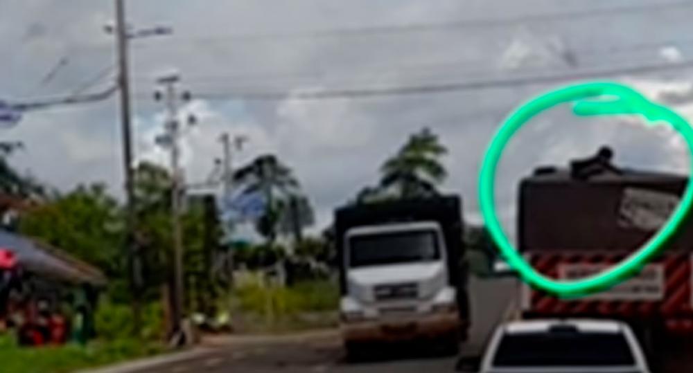 Homem pendurado em carreta em movimento causa pânico na BR-364